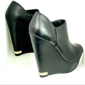 Steve Madden super high wedge booties black